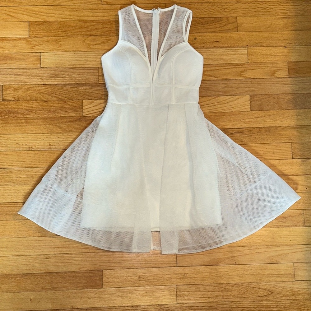 White sleeveless dress. Outside layer is a sturdy mesh New with tags